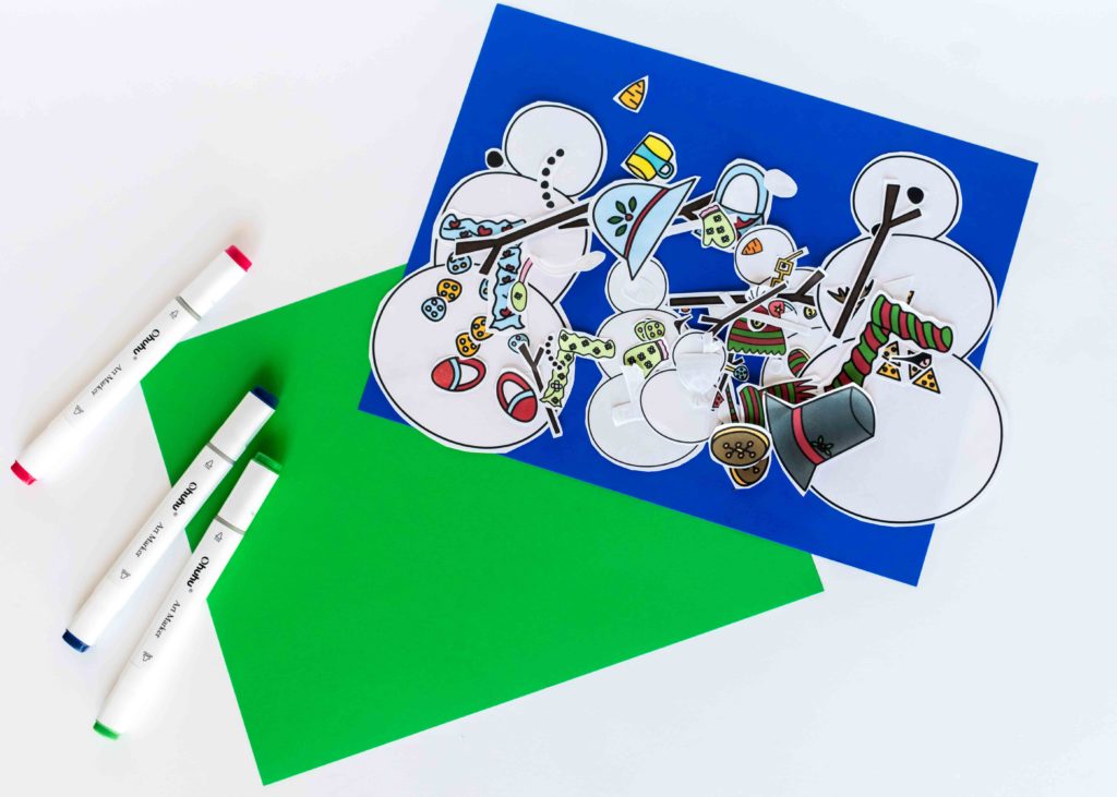 snowmen printable and craft made with markers and blue and green construction paper