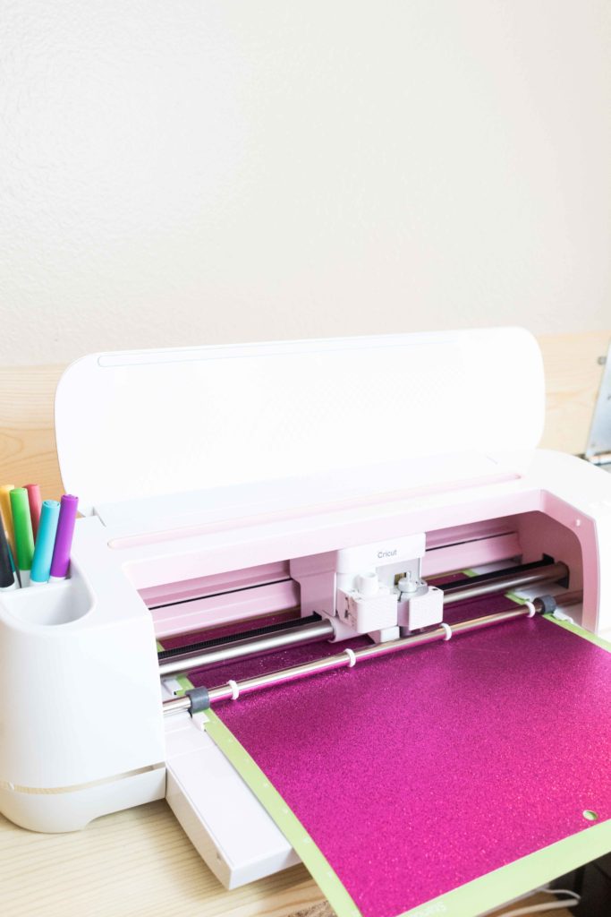Load Mat and tools to your Cricut to cut glitter cardstocl