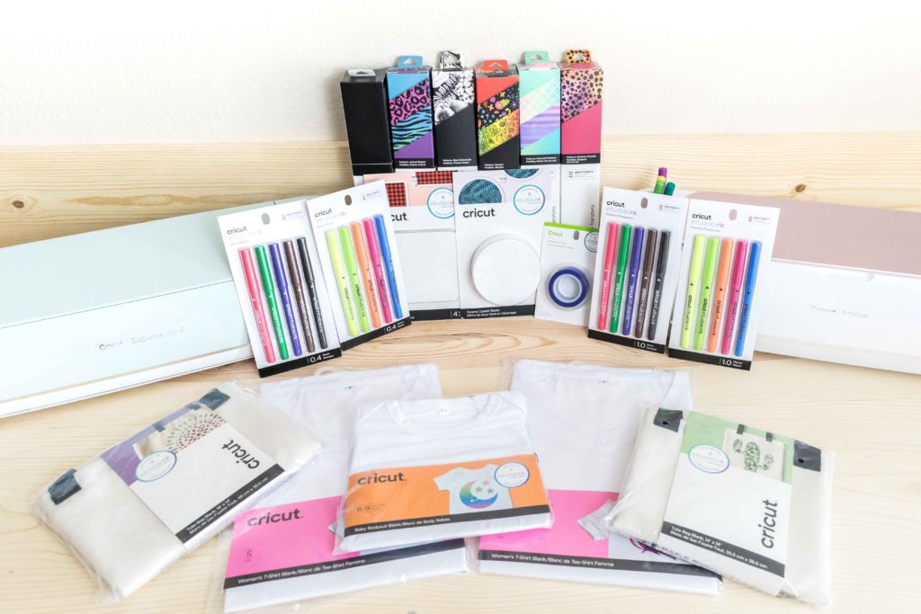Display of Cricut Maker and Explore with Infusible Ink Product Lines (Transfer sheets, totes tshirts, pens, coasters, transfer tape, etc)