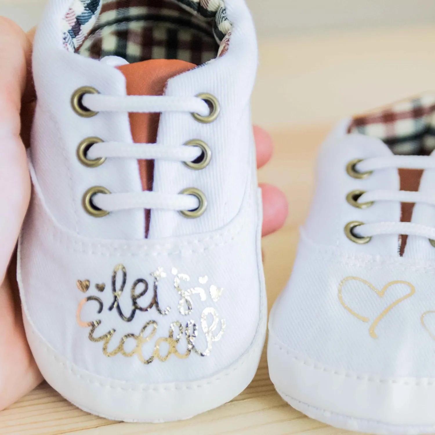 baby shoes made with foil iron on and Cricut Easypress Mini