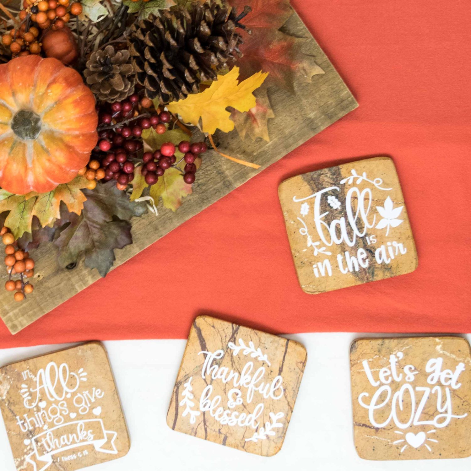 Coasters decorated with white vinyl for fall
