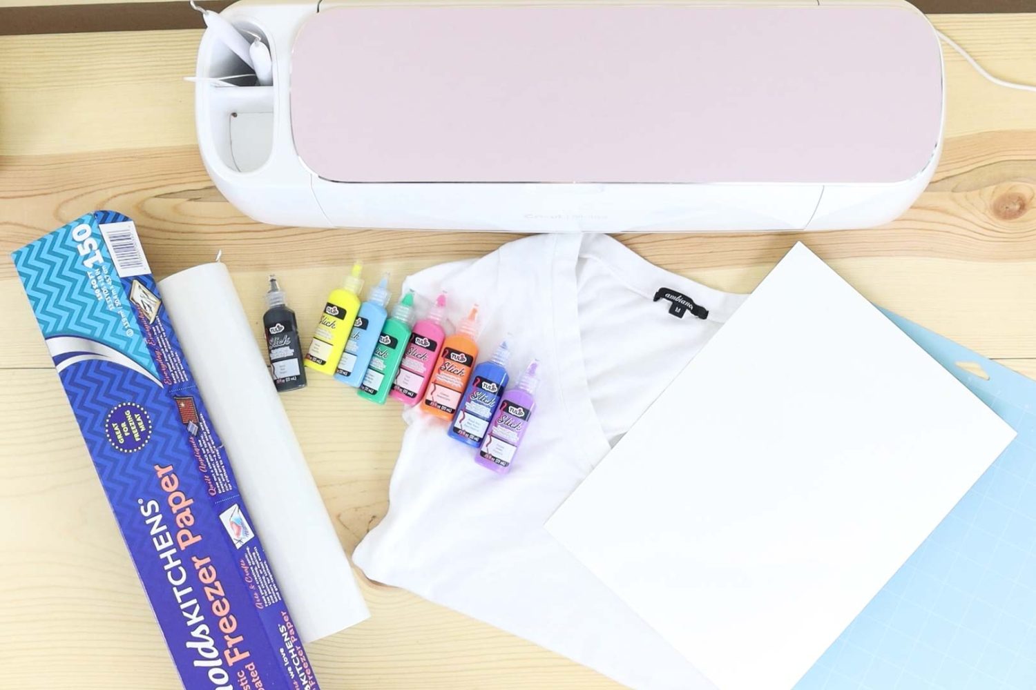 Materials needed to make a t-shirt with the freezer paper method