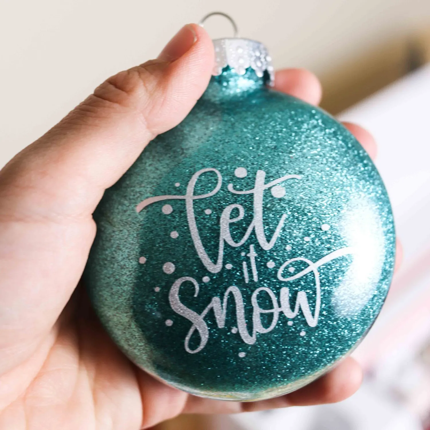 let it snow Christmas ornament made with Cricut