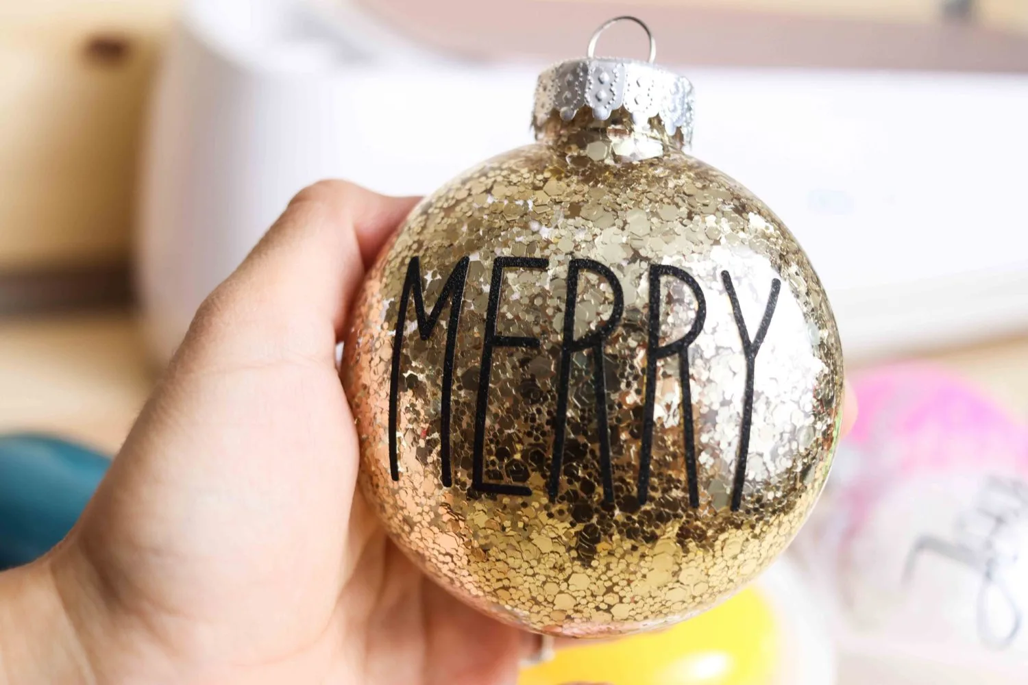 Merry christmas ornaments decorated with Cricut Maker