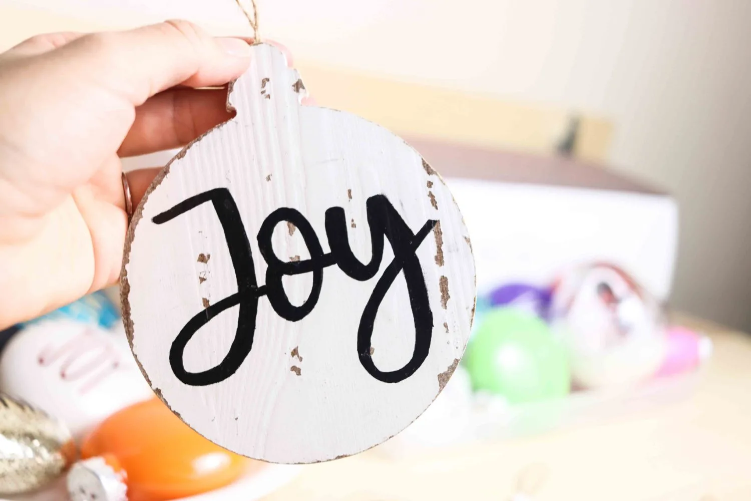 Painting wooden Christmas Ornament  with paint marker