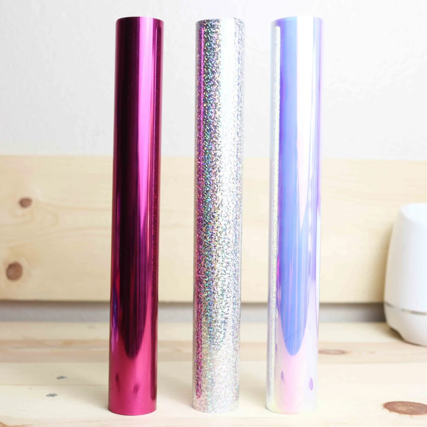 Foil, holographic sparkle and holographic iron-on rolls.