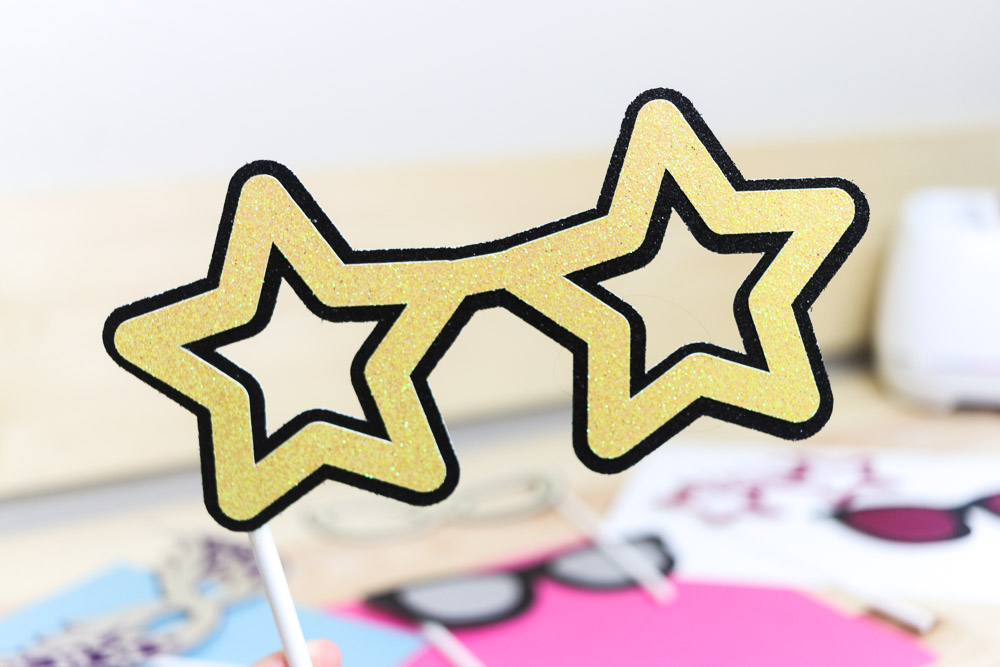 star shaped glasses made with glitter cardstock and Cricut
