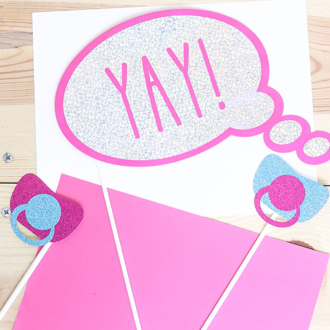 photo props for baby shower or gender reveal made with the Cricut machine