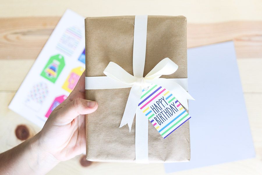 Wrapped present with a colorful birthday gift tag