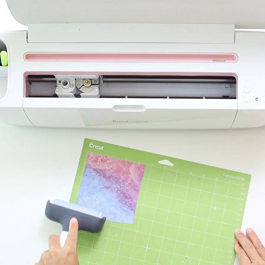 placing infusible ink transfer sheet on cricut mat
