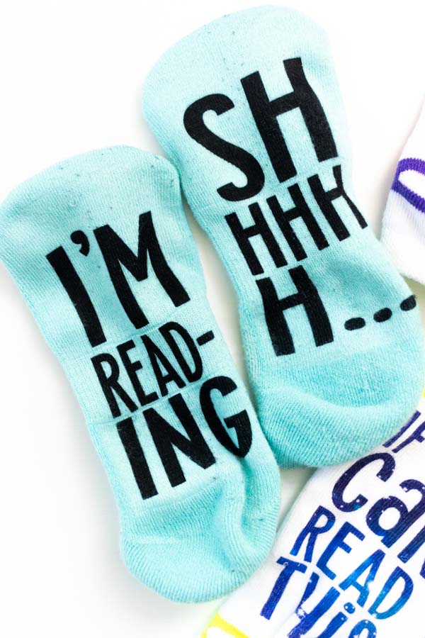 Shhh I am reading personalized socks with cricut