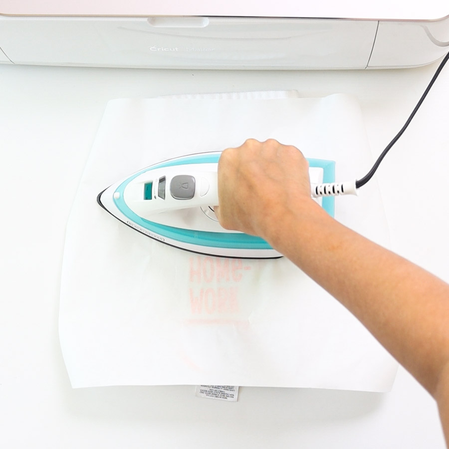 pressing htv on sock with a household iron