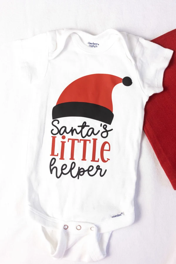 Santa's little helper onesie made with Cricut