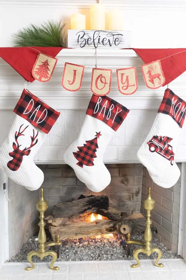 Fire place decorated for Christmas with Cricut 