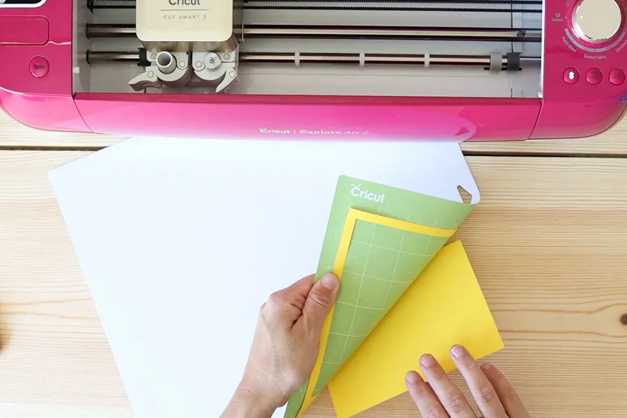 removing yellow cardstock from green mat