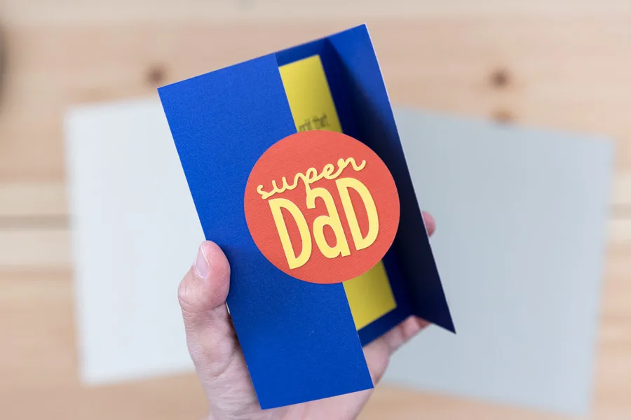 super dad card (blue, yellow and red).