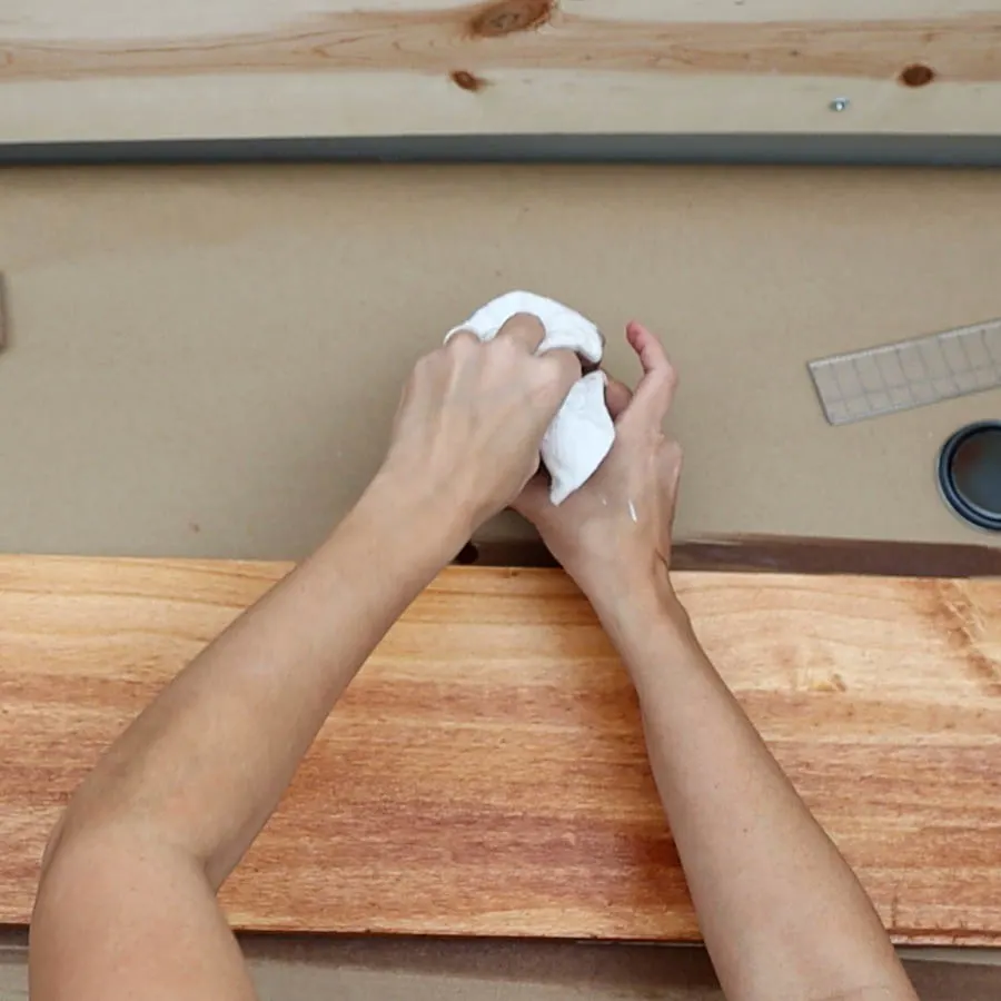 using a cloth to stain wood