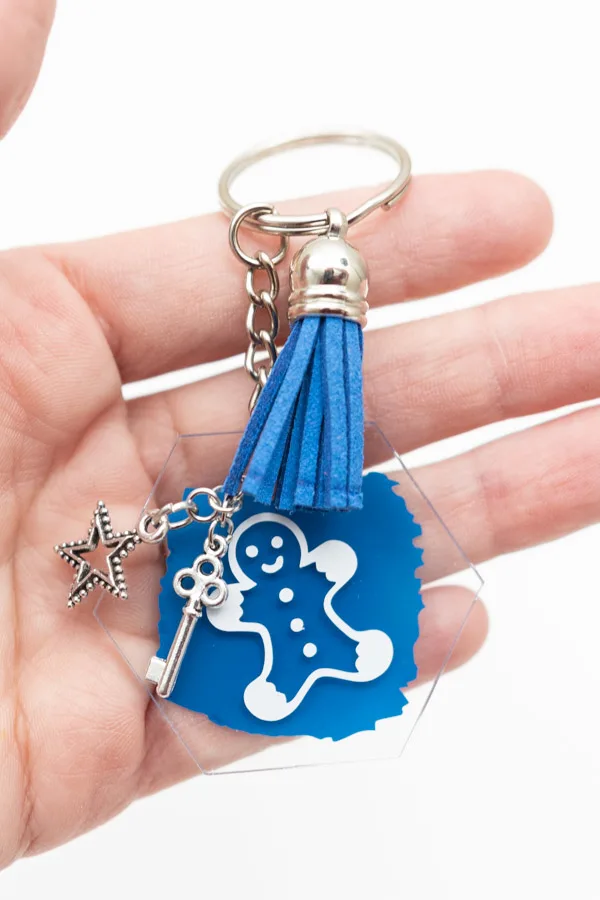holding gingerbread keychain 