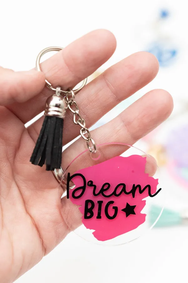 holding dream big keychain 