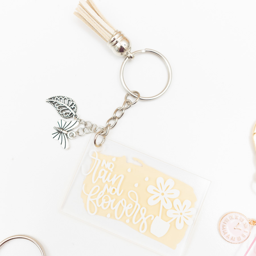 yellow and silver keychain no rain no flowers