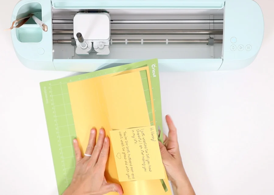 removing yellow cardstock with wet ink from cricut mat