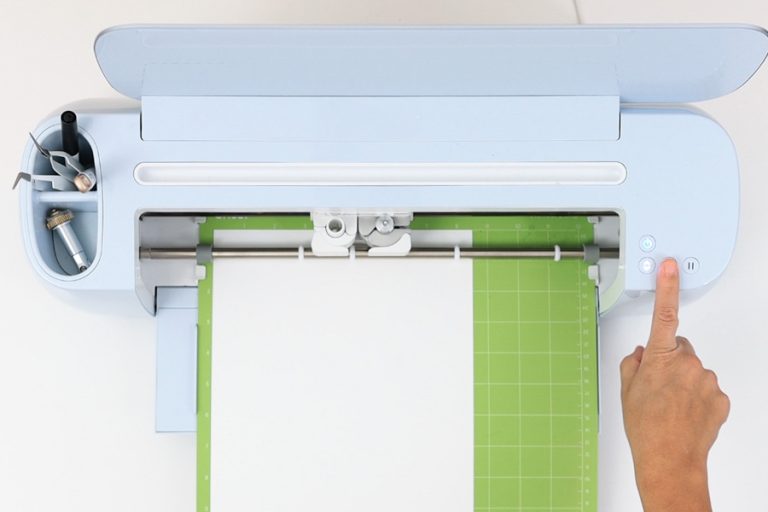 Place your material on the mat and load it into the Cricut machine