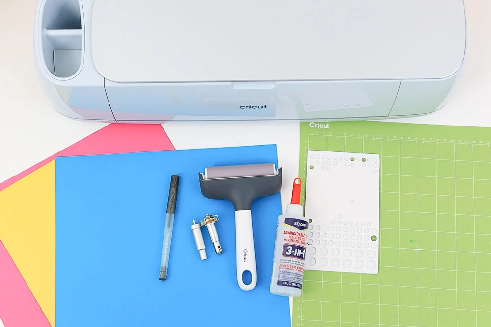tools and materials to make a valentine's day card with cricut