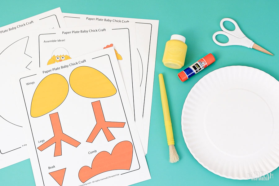 materials for paper plate chick craft.