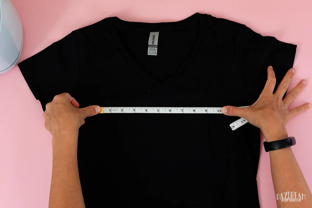 measure t-shirt to find out what vinyl size to use.