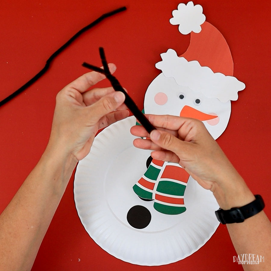 make snowman's arms with pipe cleaners