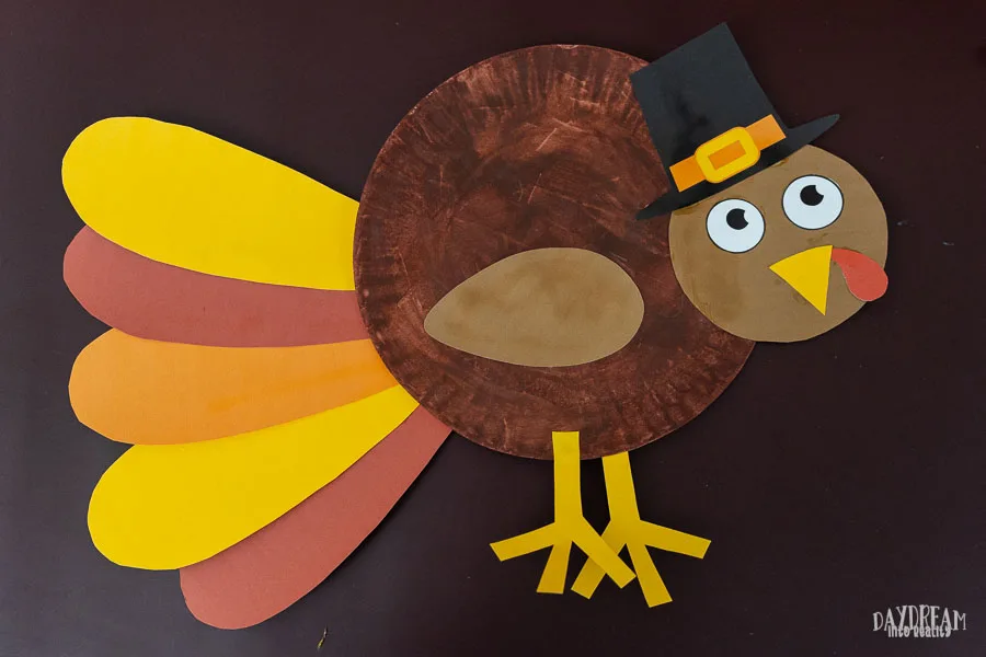 cute turkey craft for kids with pilgrim hat (tail on the side)