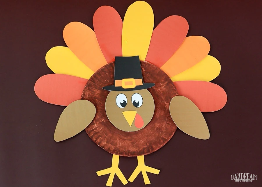cute turkey craft for kids with pilgrim hat and looking front.
