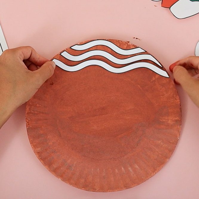 glue icing to paper plate