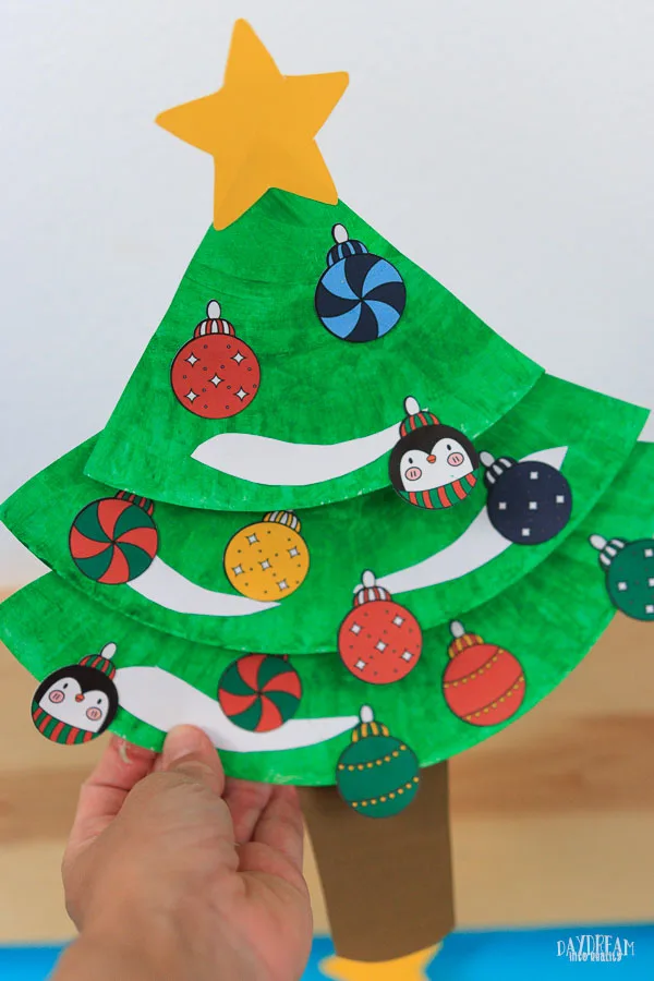 paper plate Christmas tree made with ornaments in template