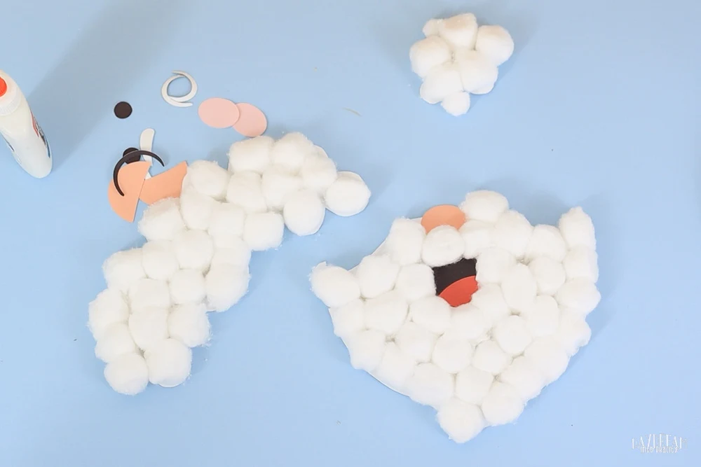 finish gluing all cotton balls to the craft