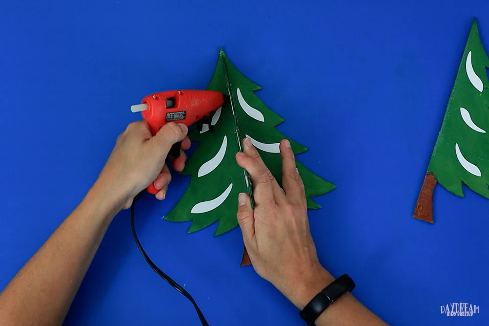 using hot glue to assemble Cardboard tree part 3